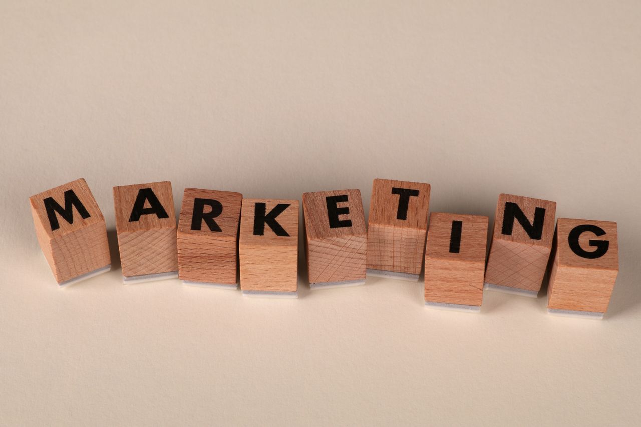 services-03 Wooden blocks with letters spelling 'marketing', ideal for business and advertising visuals.